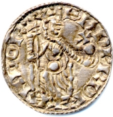 obverse of a silver penny of Edward the Confessor, showing him enthroned