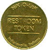 Image of the obverse of a Restroom token, Vermont Transit System